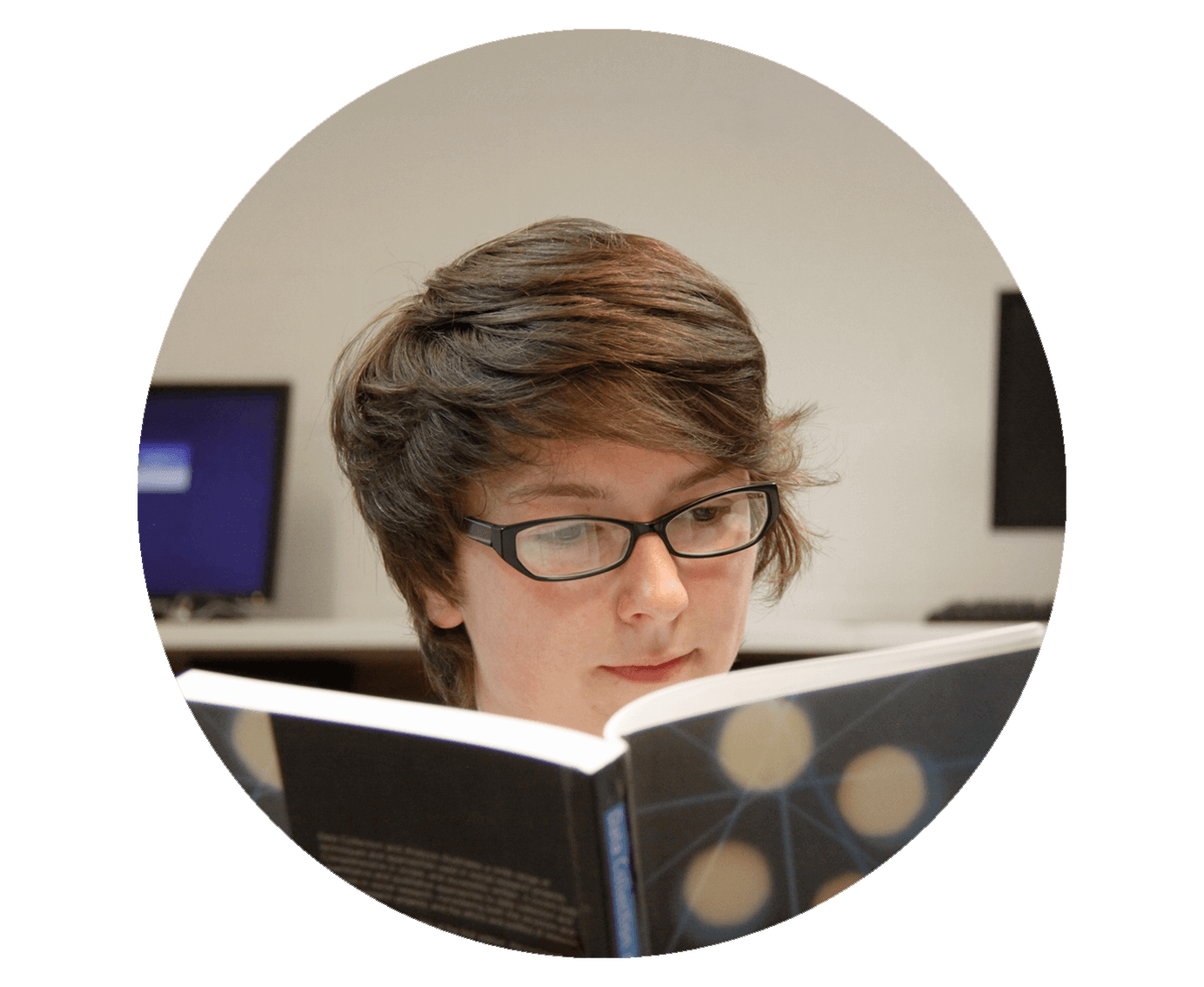 Image of a student reading a book